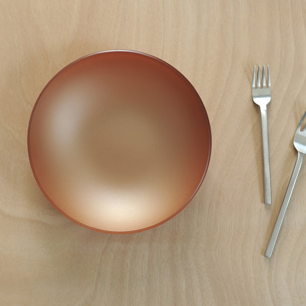 Copper 10" SeaGlass bowl on table with forks